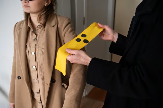 Man helping blind woman putting her armband 23 2149261361